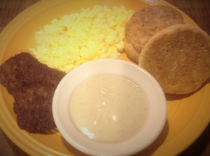 Breakfast: Sausage, scrambled eggs, biscuits and gray